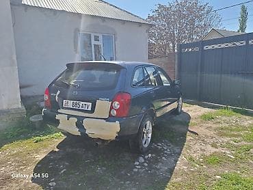 fit shuttle: Mazda 323: 2002 г., 1.6 л, Ручные, Бензин, Хэтчбэк — 5