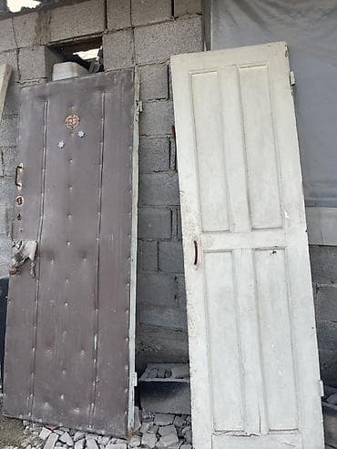 Двери (2 шт.) - Металлическая входная дверь: обивка дерматином