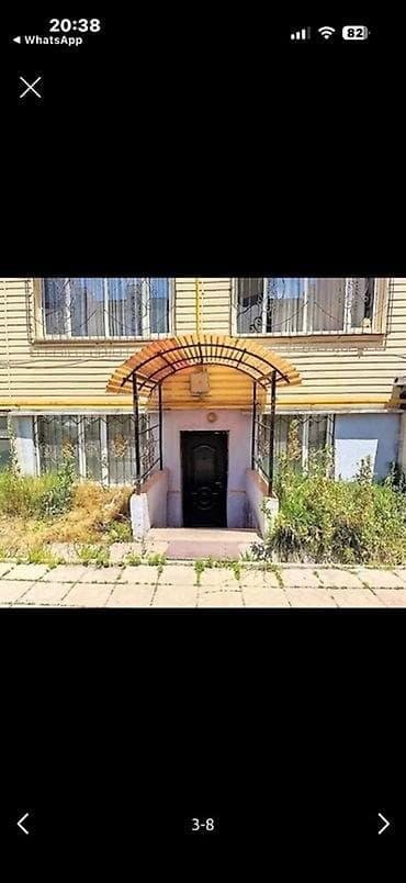 Дубленки: Пуховая куртка женская, утеплённая, черного цвета - Длина: до бедра — 7