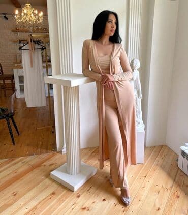 Продаю шикарную новую двойку .Брюки и накидка. Ohkiki. Размер М