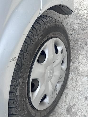 кабина волво: Mazda 323: 2000 г., Механика, Универсал — 5