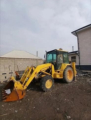 Экскаватор, Caterpillar, Колесный