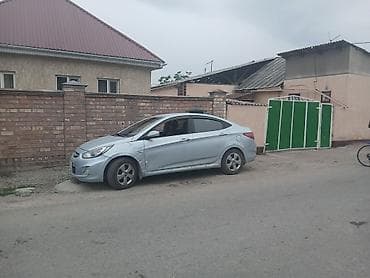 mini ev: Hyundai Solaris: 2011 г., Седан — 2