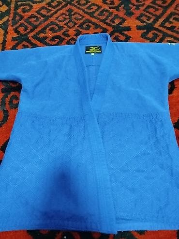 Кимоно (кимоно-куртка и штаны) для дзюдо, синего цвета. Особенности