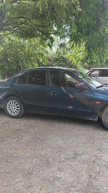 Транспорт: Mitsubishi Galant: 1997 г., 2.5 л, Кол менен иштөөчү, Бензин, Седан — 3