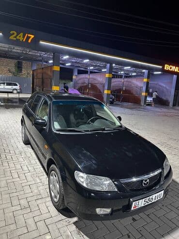 полик нексия 2: Mazda 323: 2001 г., 1.6 л, Механика, Бензиновая, Седан — 9