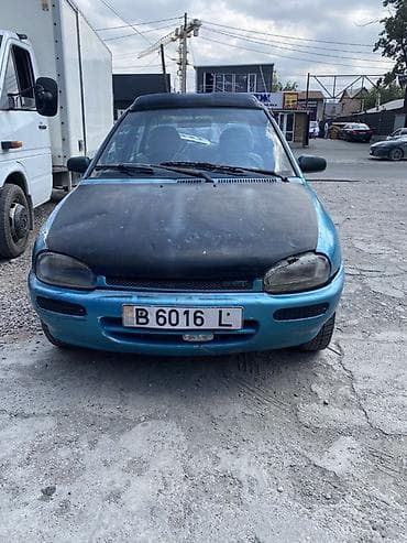 Унаа сатуу: Mazda 121: 1991 г., Кол менен иштөөчү, Бензин, Седан — 1