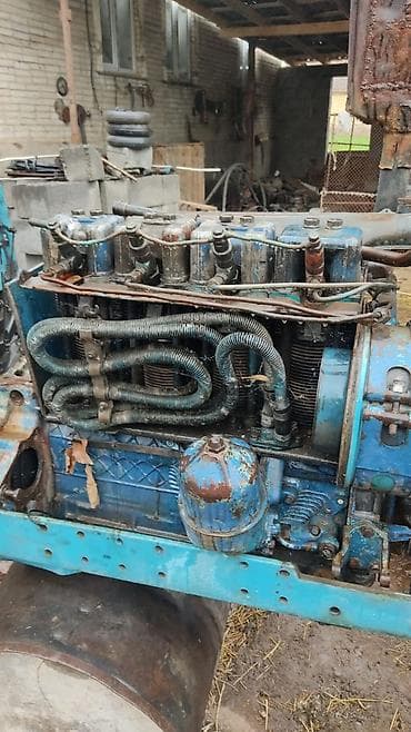 Двигатель дизельный от трактора (вероятно рядный, воздушного