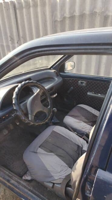 диск на форестер: Daihatsu Cuore: 1991 г., Механика, Хэтчбэк — 4