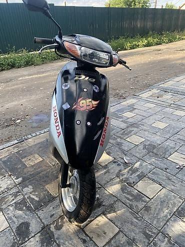 Скутер Honda Dio (AF) — компактный городской скутер с двухтактным