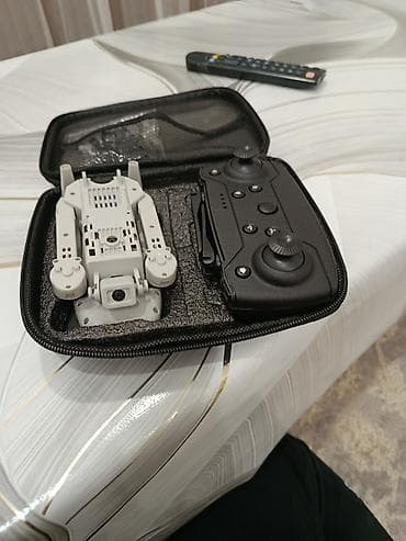 Дрондор: Складной квадрокоптер с пультом управления и кейсом Комплектация: - — 4