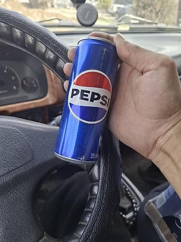 Pepsi, газированный безалкогольный напиток в алюминиевой банке 250 мл