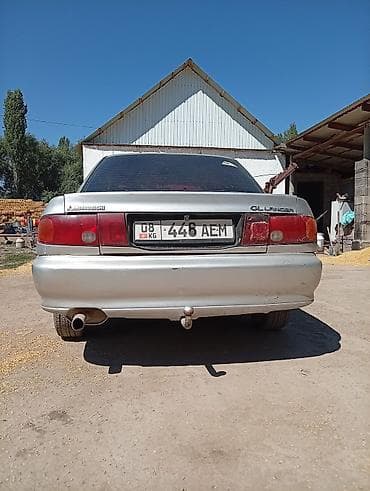 Транспорт: Mitsubishi Lancer: 1993 г., 1.6 л, Механика, Бензин, Седан — 6