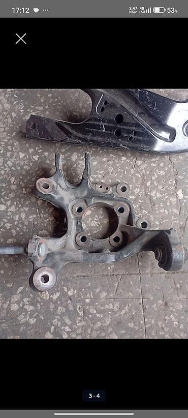 Кронштейн/кулак задней подвески (поворотный кулак) правый. -