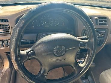 3c te: Mazda 323: 1998 г., 1.6 л, Автомат, Бензин, Седан — 4