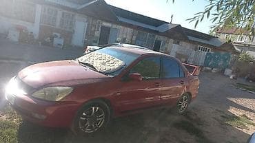 Транспорт: Mitsubishi Lancer: 2003 г., Седан — 5