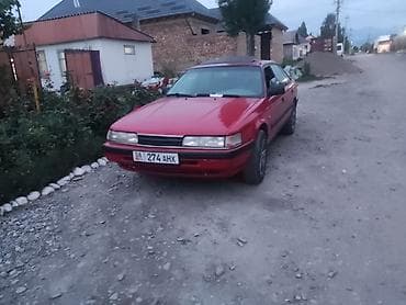 Унаа: Mazda 626: 1989 г., Кол менен иштөөчү, Седан — 9
