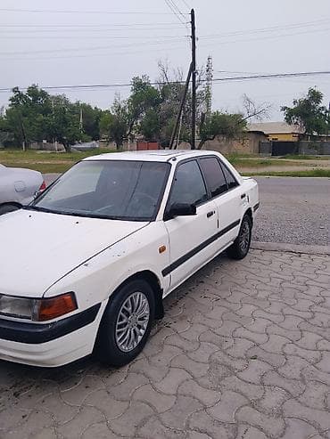 zero x neo: Mazda 323: 1990 г., Механика, Бензин, Седан — 1