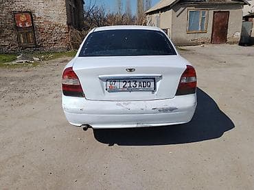 света: Daewoo Magnus: 2001 г., 1.5 л, Автомат, Бензин, Седан — 7