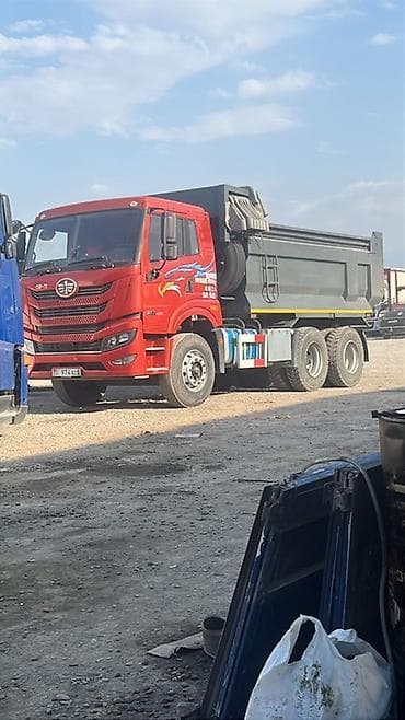 1g fe beams: Услуги самосвала FAW Jiefang Перевозки сыпучих материалов: щебень — 1