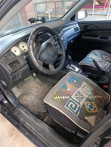 молдинг е39: Mitsubishi Lancer: 2005 г., Седан — 9