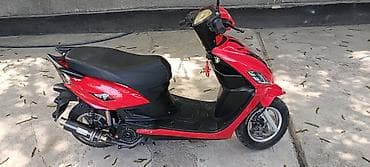 mini ev: Скутер/мопед класса 50–125 см³, стильный городской вариант в ярком — 3