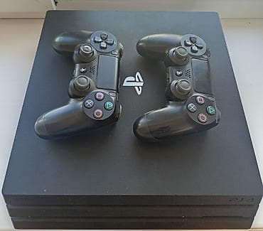 игры пс5 купить: PlayStation 4 Pro с двумя беспроводными геймпадами DualShock 4. - — 1