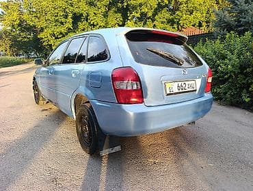 bvd e2: Mazda 323: 2003 г., 1.6 л, Механика, Бензин, Универсал — 6