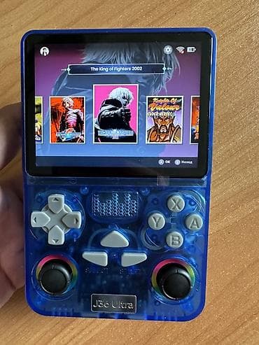 Техника и электроника: Портативная игровая консоль J36 Ultra (синий прозрачный корпус) - — 4
