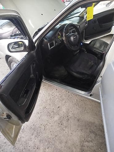 е34 2 5: Daewoo Nexia: 2012 г. — 5