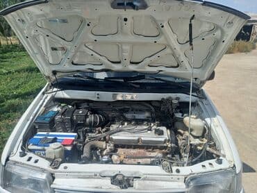 доставка аккумулятора бишкек: Просторный минивэн белого цвета с рейлингами на крыше — 7