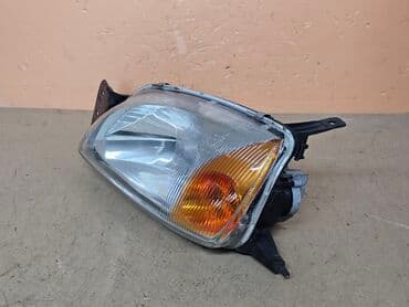автозапчасти для форд фокус 2: Передняя левая фара Ford 2000 г., Б/у — 4