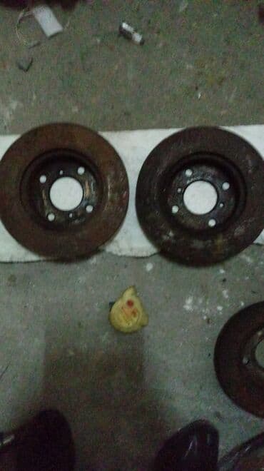 перфорированные тормозные диски: Тормозной диск на Сузуки Альто . из Японии — 1