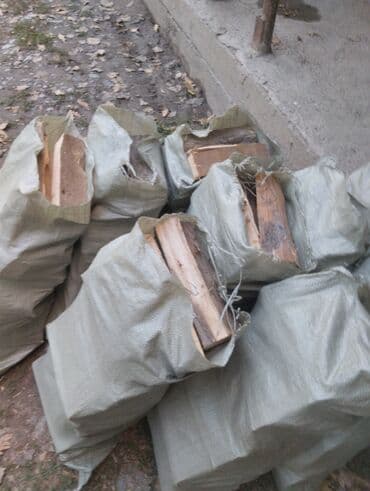 пакеты для фасовки: Дрова в мешках - Колотые поленья, уложены в прочные полипропиленовые — 1