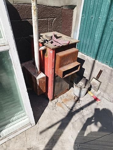 Твердотопливная печь с дымоходом - Материал: стальной корпус, топка