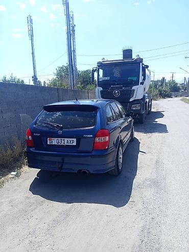 хром молдинг: Mazda 323: 2000 г., Хэтчбэк — 2