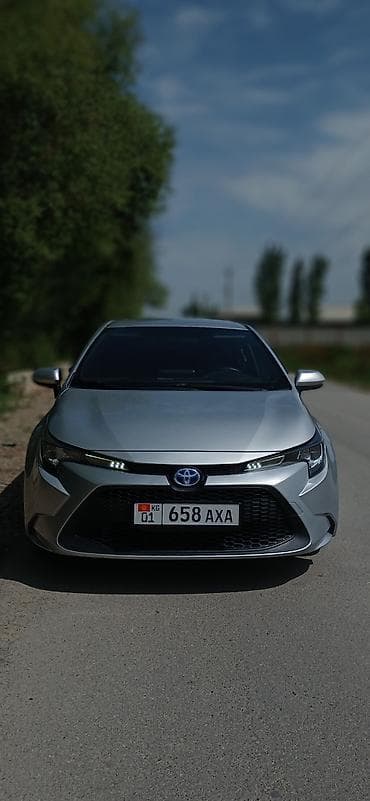 runx alex: Toyota Corolla: 2020 г., 1.8 л, Вариатор, Гибрид, Седан — 1