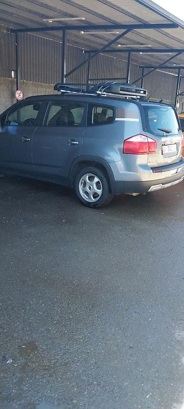 7 мест 3 ряда сидений: Chevrolet Orlando: 2016 г., 0.2 л, Автомат, Газ, Кроссовер — 5