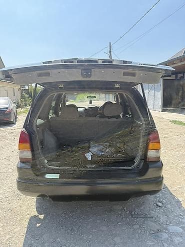 форестер 2001: Mazda Tribute: 2001 г., 2 л, Автомат, Бензин, Кроссовер — 6