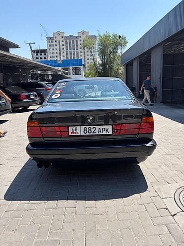 gac aion i60: BMW 5 series: 1990 г. — 3