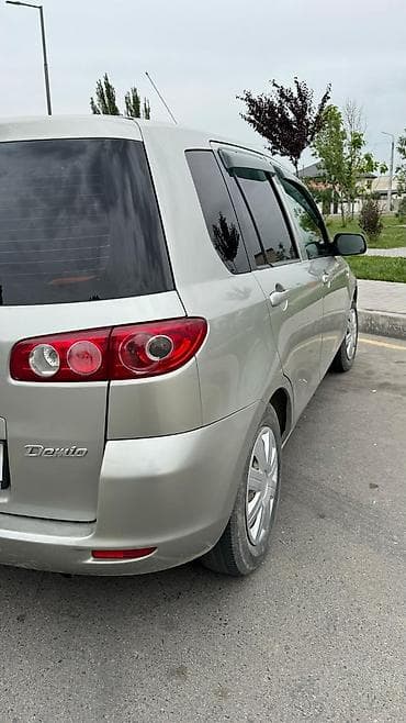 багаж на демио: Mazda Demio: 2004 г., 1.3 л, Автомат, Бензин, Хэтчбэк — 7