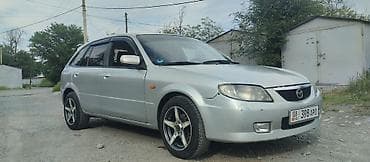 митсубиси спейк стар: Mazda 323: 2001 г., 1.6 л, Механика, Газ, Хэтчбэк — 5