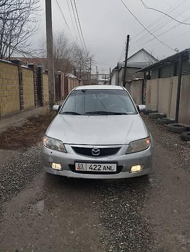 Скупка авто: Mazda 323: 2003 г., Механика, Бензин, Универсал — 7