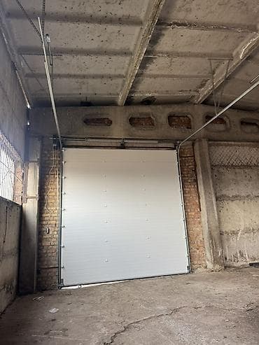 Секционные ворота: Секционные промышленные ворота с калиткой - Тип: подъемно-секционные — 6