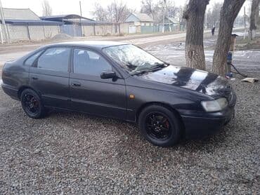 тайота ландкрузер 80: Toyota Carina: 1995 г., 2 л — 3