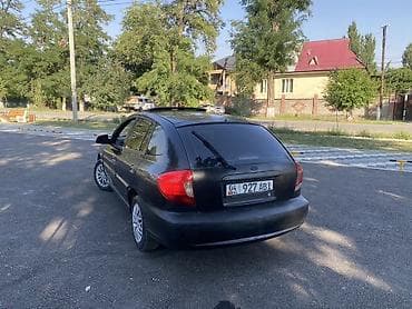 ravon r4: Kia Rio: 2003 г., 1.4 л, Механика, Бензин, Хэтчбэк — 3