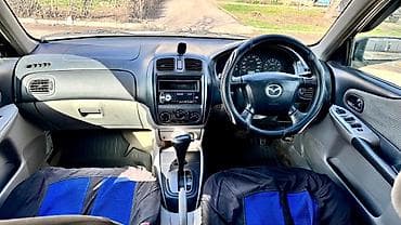 скупка мазда: Mazda Familia: 2002 г., 1.5 л, Автомат, Бензин, Универсал — 5