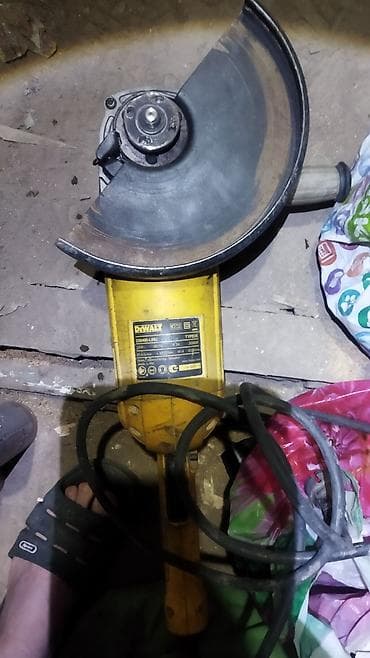 аренда шлифовальная машинка: Угловая шлифмашина (болгарка) DeWALT D28490-LIRU TYPE 05 - Мощность — 5