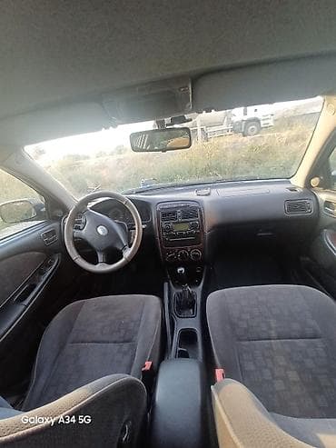 byd leopard 8: Toyota Avensis: 2001 г., 1.8 л, Механика, Бензин, Универсал — 6