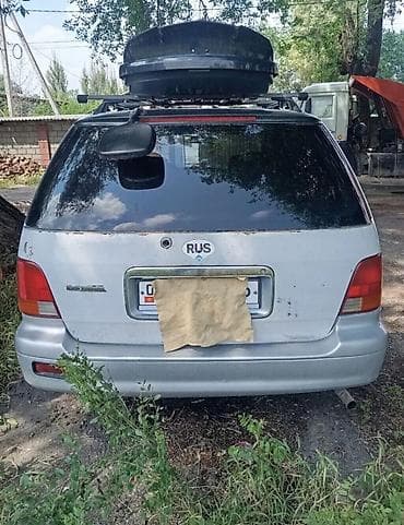 подкрылок одиссей: Honda Odyssey: 1994 г., 2.3 л, Автомат, Бензин, Универсал — 1
